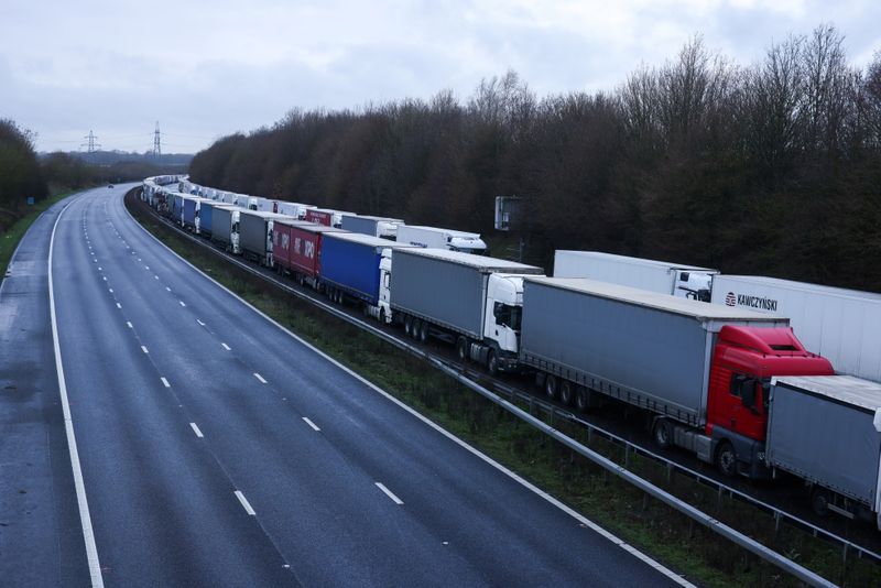 © Reuters. Lorries are seen parked on the M20 motorway near Ashford