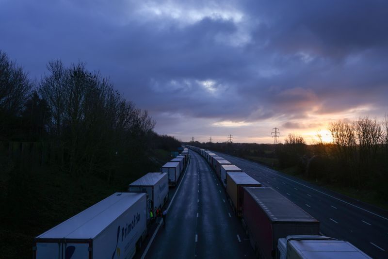 © Reuters. Lorries are seen parked on the M20 motorway near Ashford