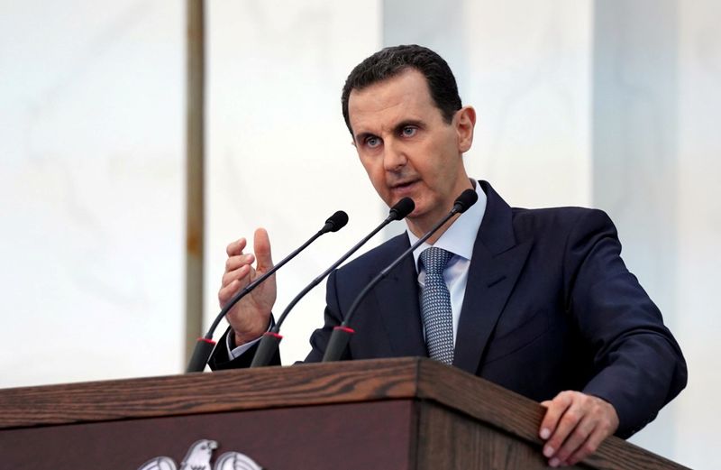 © Reuters. FILE PHOTO: Syria's President Bashar al-Assad addresses the new members of parliament in Damascus