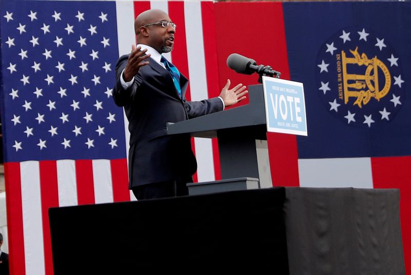 &copy; Reuters. FILE PHOTO: U.S. President-elect Joe Biden campaigns on behalf of Democratic U.S. senate candidates Ossoff and Warnock in Atlanta, Georgia U.S. President-elect Joe Biden campaigns on behalf of Democratic U.S. senate candidates Ossoff and Warnock in Atlant