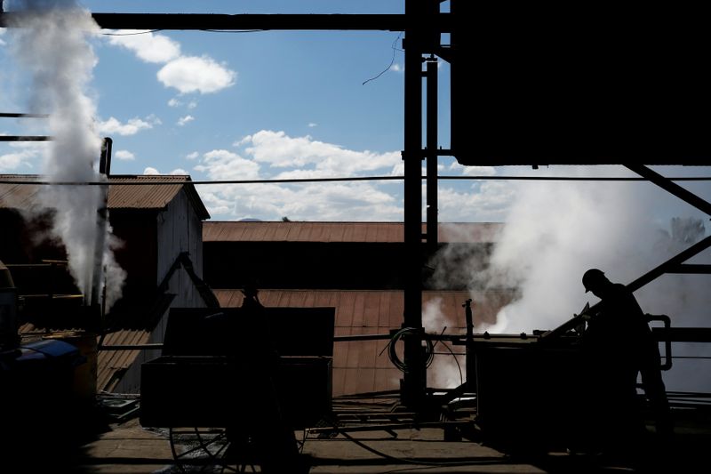 &copy; Reuters. A worker is seen inside a processing plant at Emiliano Zapata sugar mill in Zacatepec de Hidalgo