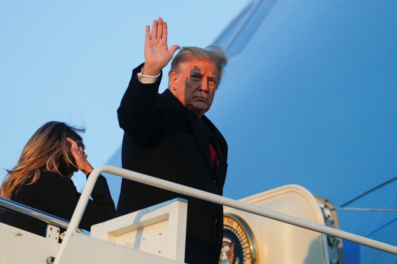 &copy; Reuters. U.S. President Donald Trump boards Air Force One beside first lady Melania Trump at Joint Base Andrews in Maryland