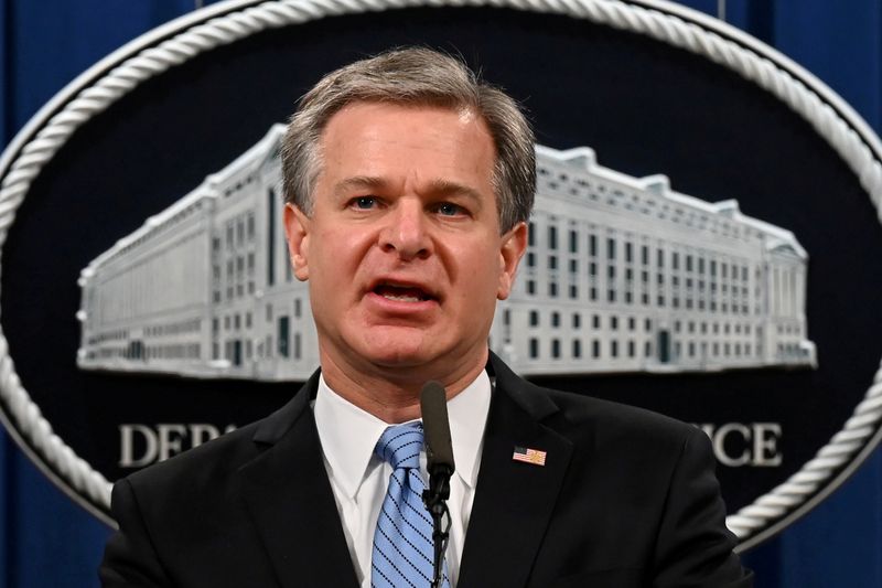 © Reuters. FILE PHOTO: FBI Director Christopher Wray speaks during a press conference on a national security matter at the Department of Justice in Washington