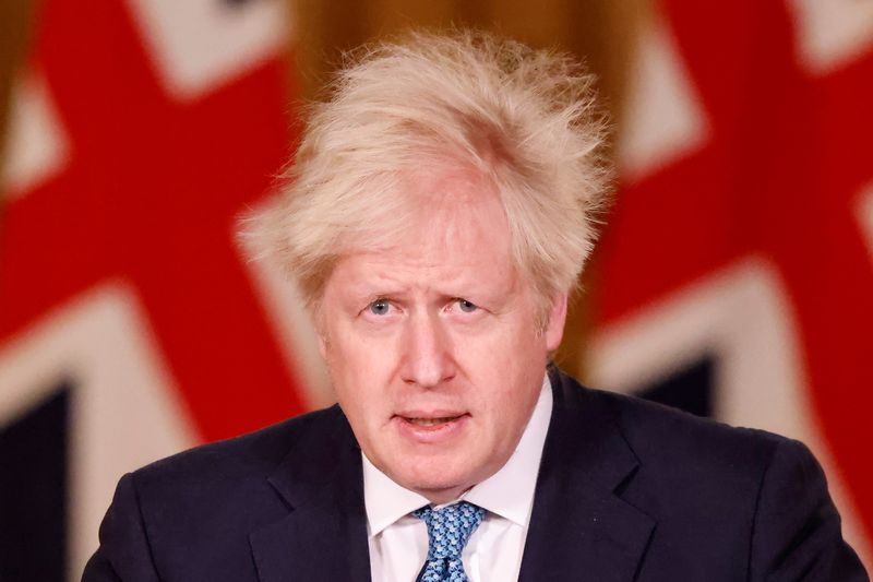 &copy; Reuters. FILE PHOTO: Britain&apos;s Prime Minister Boris Johnson speaks during a virtual news conference in London
