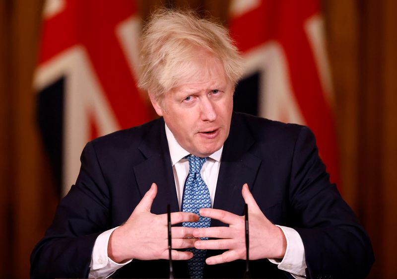 &copy; Reuters. Britain&apos;s Prime Minister Boris Johnson speaks during a virtual news conference in London