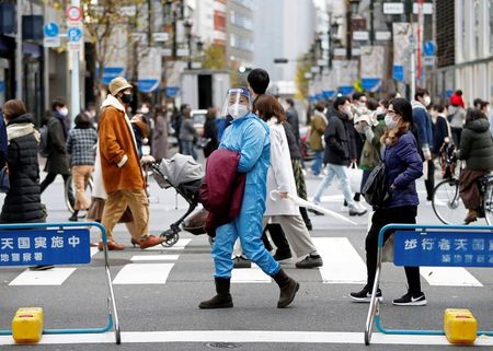 Japan panel says people 65 or older should get COVID vaccine priority By Reuters