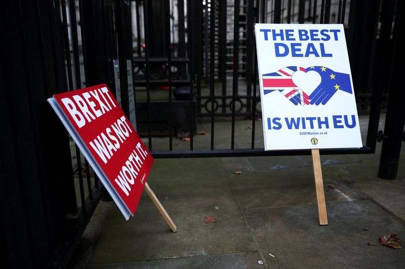 &copy; Reuters. Anti-Brexit signs are pictured at the gates of Downing Street in London