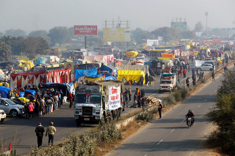 Indian farmers agree to meet government over contentious farm laws By Reuters