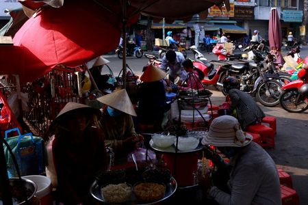 Vietnam's 2020 economic growth slips to 30-year low due to COVID-19 By Reuters
