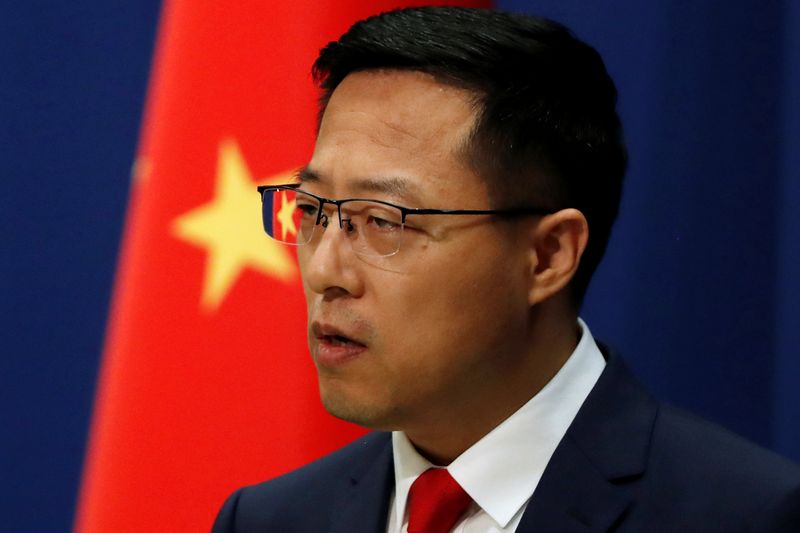 © Reuters. FILE PHOTO:  Chinese Foreign Ministry spokesman Zhao Lijian attends a news conference in Beijing, China