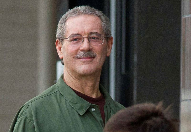 &copy; Reuters. FILE PHOTO: Allen Stanford smiles as he waits to enter the Federal Courthouse where the jury is deliberating in his criminal trial in Houston