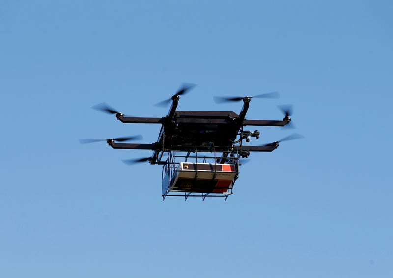 &copy; Reuters. FILE PHOTO: A drone demonstrates delivery capabilities from the top of a UPS truck during testing in Lithia, Florida