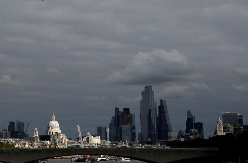&copy; Reuters. FILE PHOTO: St Paul&apos;s Cathedral is seen together with skyscrapers in the City of London financial district