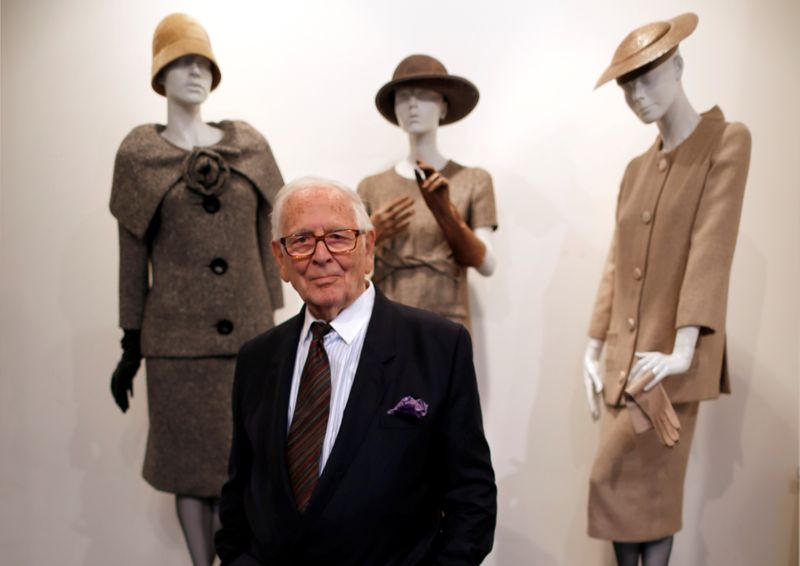 &copy; Reuters. FILE PHOTO: French fashion designer Pierre Cardin poses in front of his fashion creations in his museum called &quot;Past-Present-Future&quot; in Paris