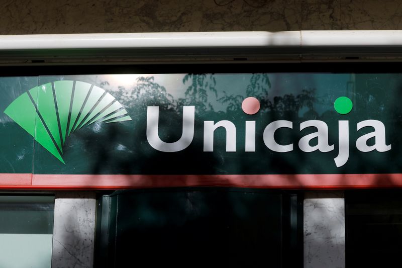 &copy; Reuters. FILE PHOTO: The logo of Unicaja bank is seen on the facade of a Unicaja bank branch in downtown Ronda