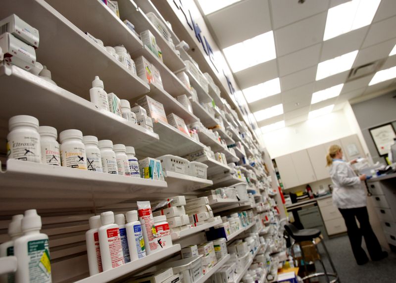 &copy; Reuters. FILE PHOTO: A pharmacist works at a pharmacy in Toronto