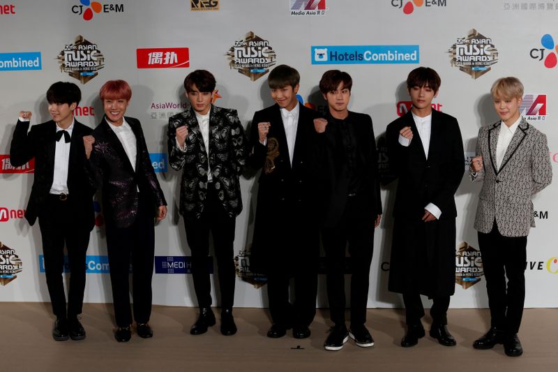 &copy; Reuters. FILE PHOTO: Members of South Korean K-pop band BTS pose during Mnet Asian Music Awards in Hong Kong