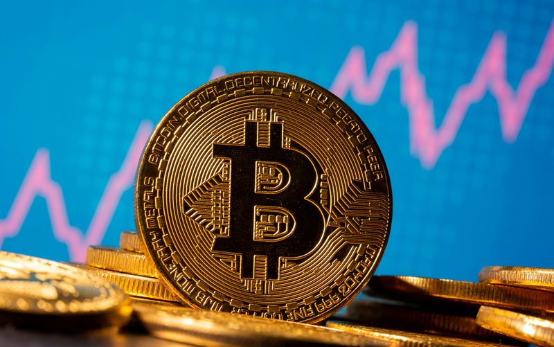 &copy; Reuters. FILE PHOTO: A representation of virtual currency Bitcoin is seen in front of a stock graph
