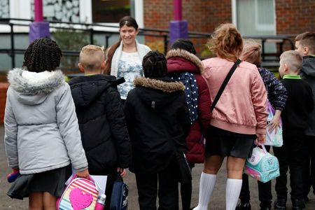 UK government under pressure to close primary schools as unions revolt By Reuters