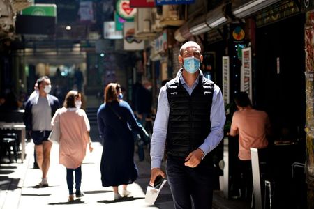 Australia's virus cluster expands further as masks made compulsory By Reuters