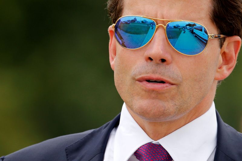 © Reuters. FILE PHOTO: Scaramucci accompanies Trump for an event about his proposed U.S. government effort against the street gang Mara Salvatrucha, or MS-13, with a gathering of federal, state and local law enforcement officials in Brentwood, New York