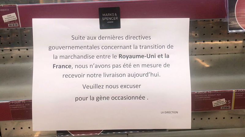 &copy; Reuters. A sign on empty shelves at a Marks&amp;Spencer store in Paris