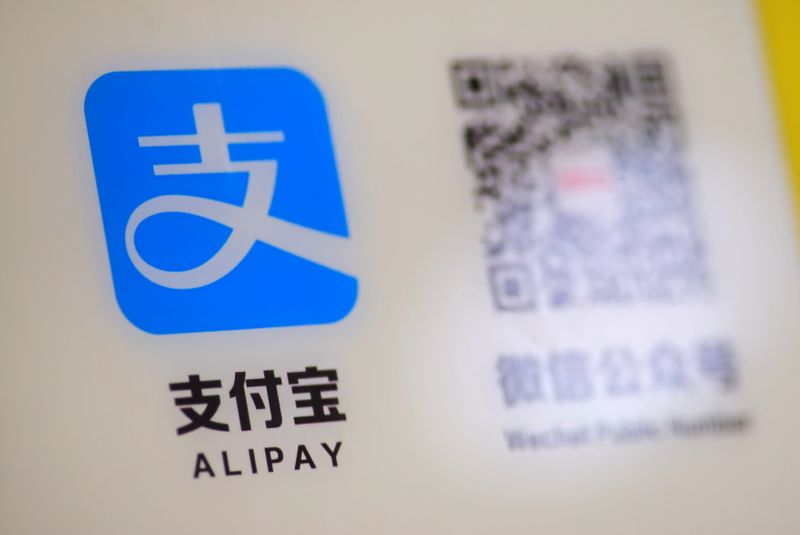 &copy; Reuters. FILE PHOTO:  A logo of the electronic payment service Alipay that belongs to Ant Group Co Ltd  is seen at a vending machine in Beijing