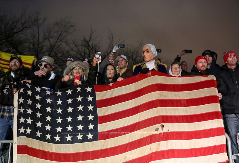 © Reuters. Supporters of U.S. President Donald Trump gather at a rally at Freedom Plaza in Washington