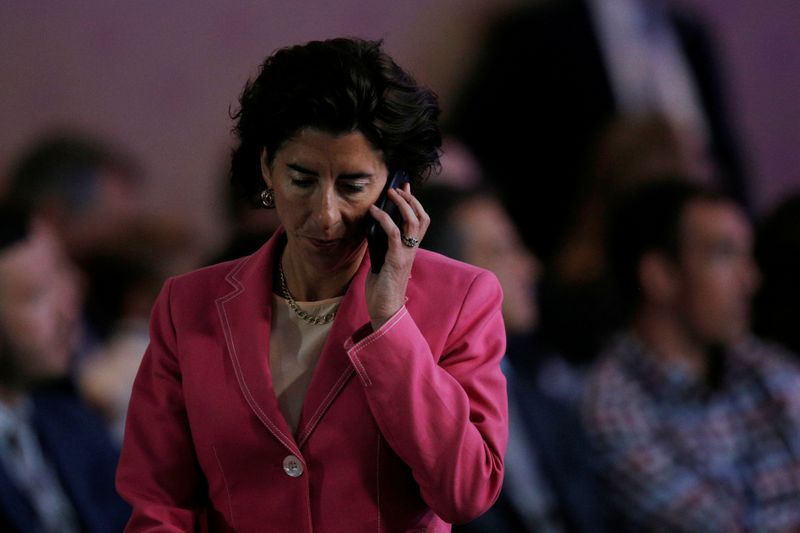 © Reuters. FILE PHOTO:  Rhode Island Governor Gina Raimondo answers a phone call during the National Governors Association Summer Meeting in Providence