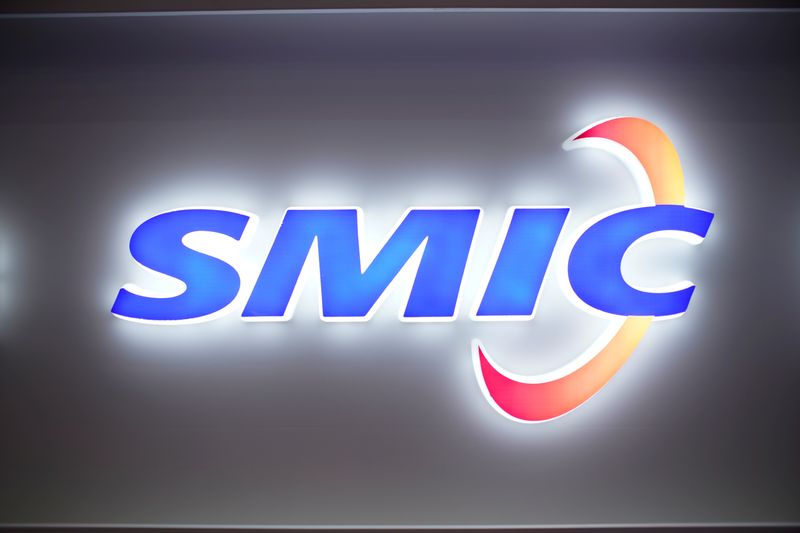 © Reuters. FILE PHOTO: A logo of Semiconductor Manufacturing International Corporation (SMIC) is seen at China International Semiconductor Expo (IC China 2020) in Shanghai