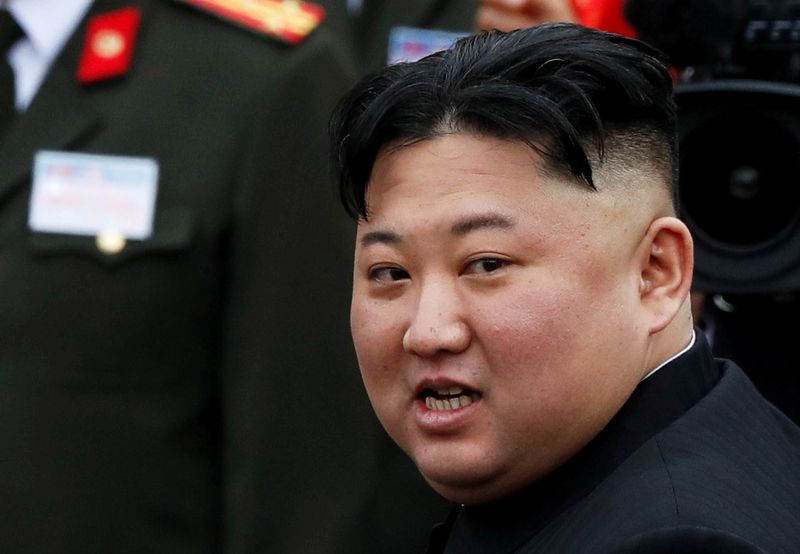 &copy; Reuters. FILE PHOTO: North Korean leader Kim Jong Un makes his way to board a train to depart for North Korea at Dong Dang railway station