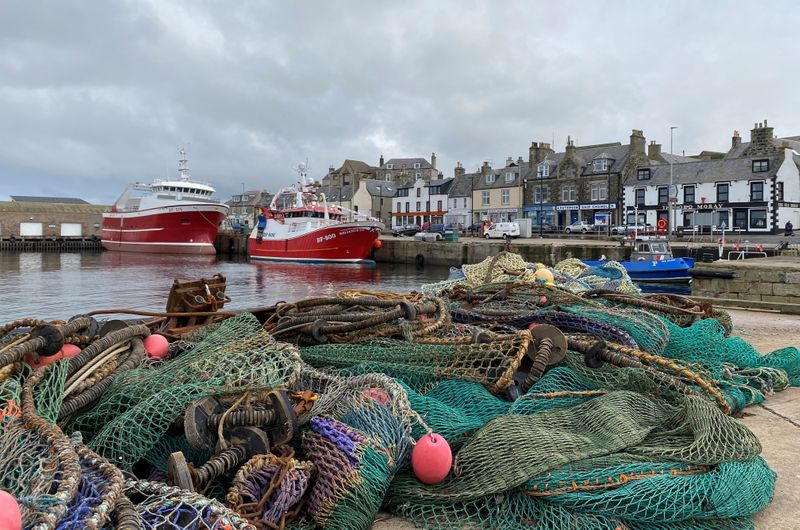 &copy; Reuters. FILE PHOTO: Fishing boat sits docked in Macduff, Aberdeenshire