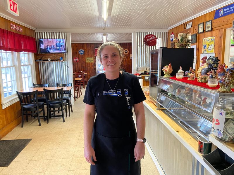 © Reuters. Linda Mashburn poses at the Tiny Town Restaurant in Homer