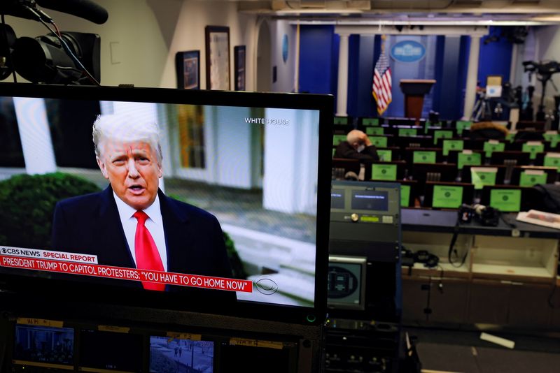 &copy; Reuters. FILE PHOTO: U.S. President Donald Trump is seen making remarks on a television monitor from the White House Briefing Room