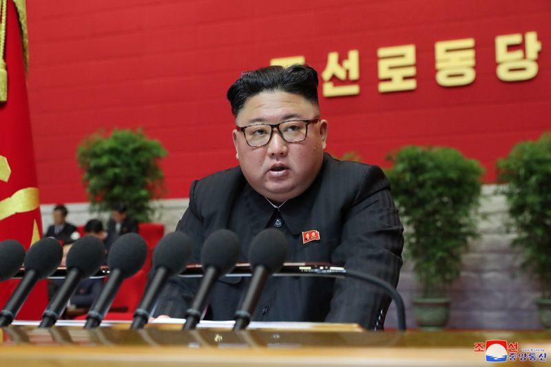 © Reuters. FILE PHOTO: North Korean leader Kim Jong Un speaks during the 8th Congress of the Workers' Party in Pyongyang
