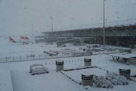 Two die in Spanish storm, troops deployed to help motorists stranded by snow By Reuters