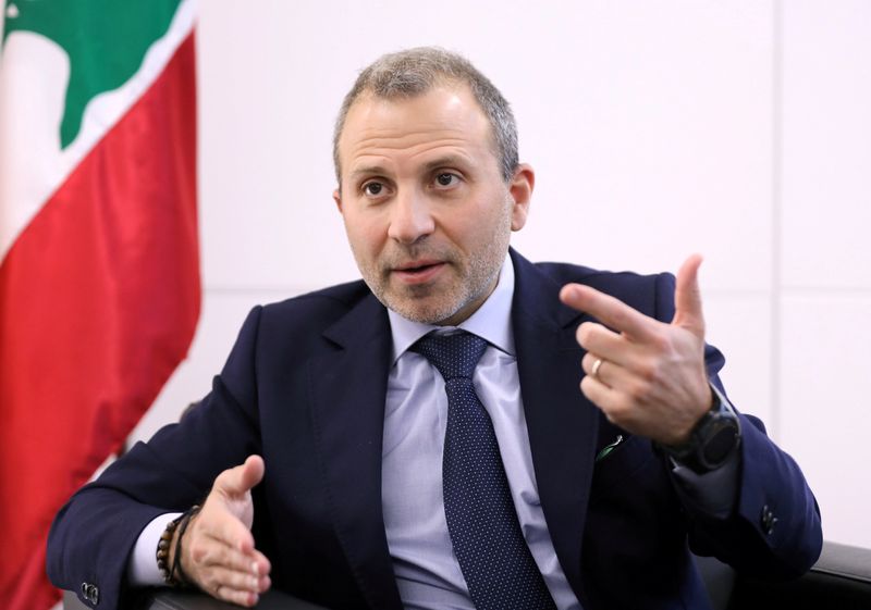 © Reuters. FILE PHOTO: Gebran Bassil, a Lebanese politician and head of the Free Patriotic movement, talks during an interview with Reuters in Sin-el-fil