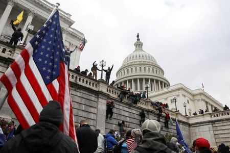 Off-duty police, firefighters under investigation in connection with U.S. Capitol riot By Reuters