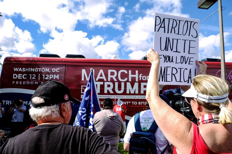 &copy; Reuters. FILE PHOTO: Trump supporters gather at Doral Central Park to kickoff the March for Trump bus tour in Doral