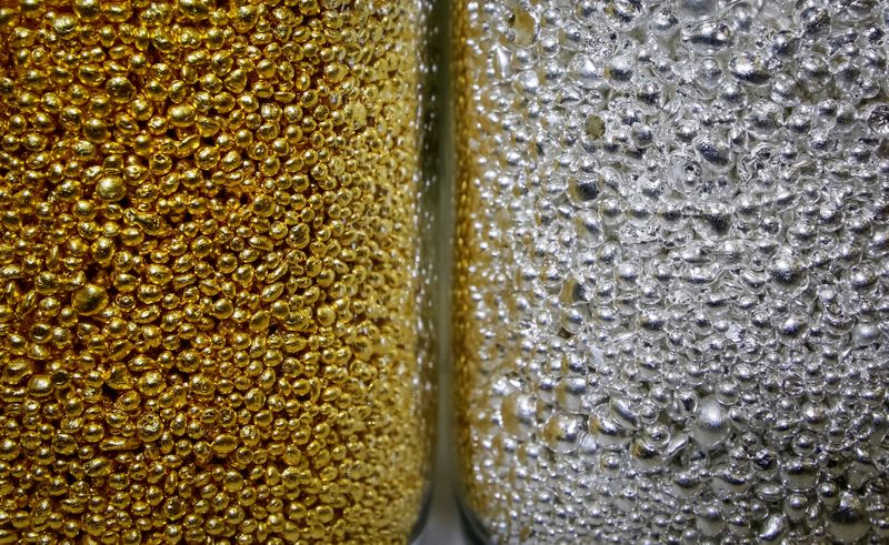 &copy; Reuters. Granules of 99.99 percent pure gold and silver are seen in glass jars at the Krastsvetmet non-ferrous metals plant in the Siberian city of Krasnoyarsk