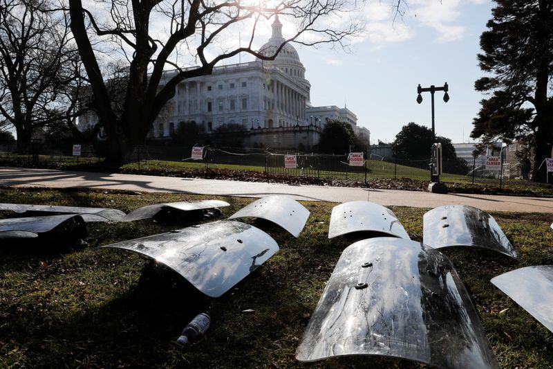 © Reuters. U.S. National Guard riot shields are laid out at the ready outside the U.S. Capitol Building