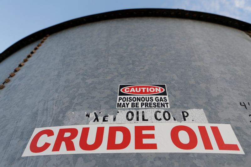 &copy; Reuters. FILE PHOTO: A sticker reads crude oil on the side of a storage tank in the Permian Basin