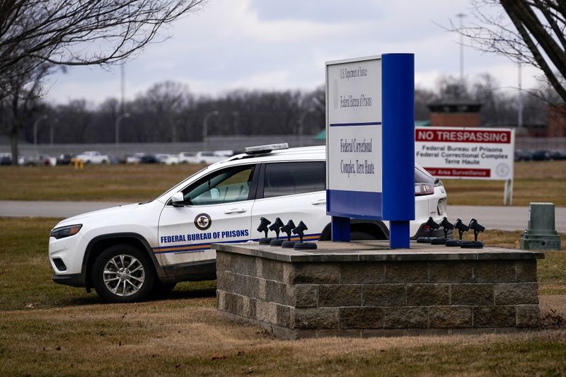 &copy; Reuters. A prison official patrols around the United States Penitentiary in Terre Haute