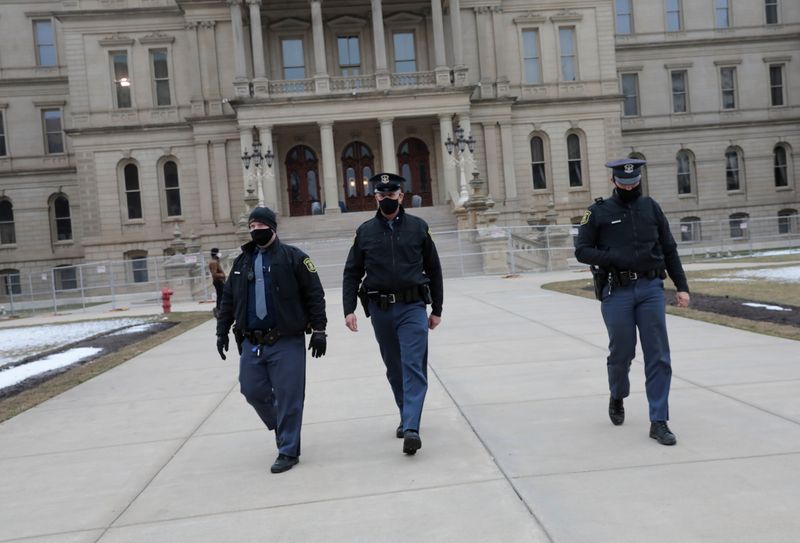 &copy; Reuters. State police patrol outside the Michigan State Capitol ahead of Sunday&apos;s expected protests in Lansing, Michigan
