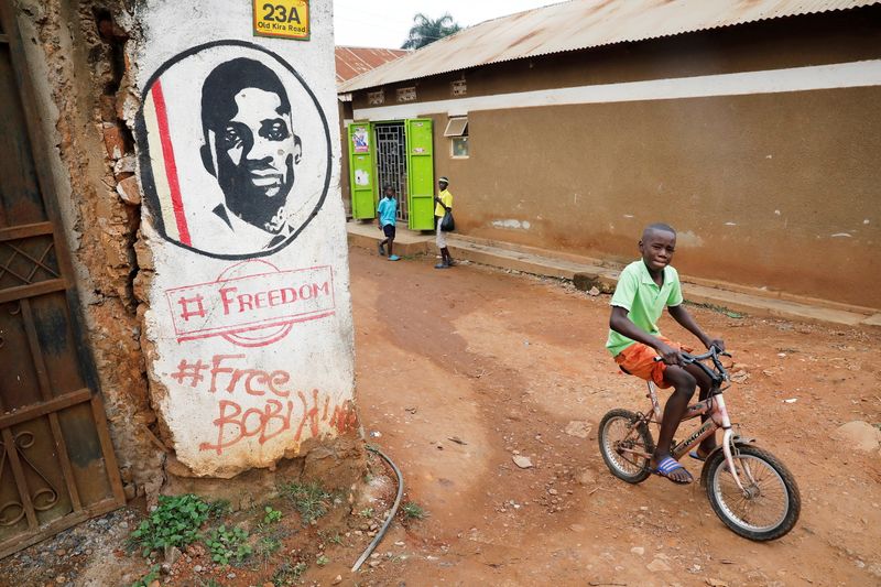 &copy; Reuters. A graffiti calling to free Ugandan opposition presidential candidate Robert Kyagulanyi, also known as Bobi Wine, is seen on a street in Kampala