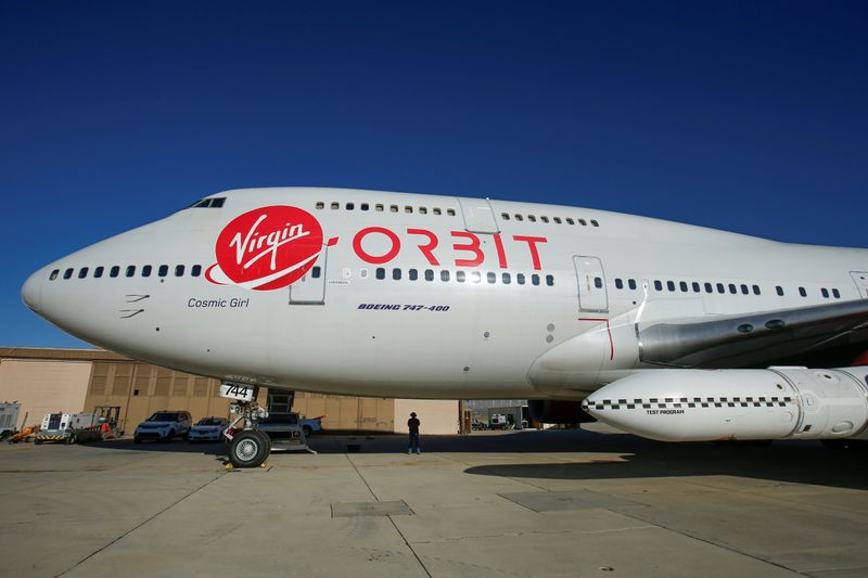 &copy; Reuters. FILE PHOTO: Richard Branson&apos;s Virgin Orbit, with a rocket underneath the wing of a modified Boeing 747 jetliner, prior to its takeoff on a key drop test of its high-altitude launch system for satellites from Mojave, California