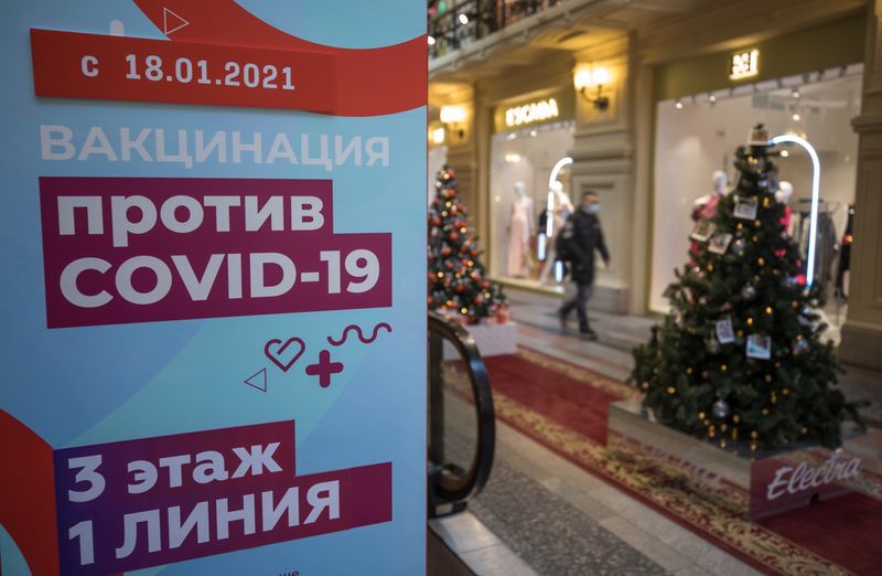 &copy; Reuters. An information sign about a vaccination centre is pictured at the State Department Store, GUM, in Moscow
