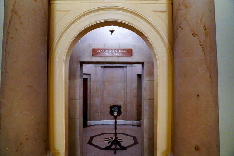 &copy; Reuters. U.S. House Speaker Nancy Pelosi&apos;s office placard is replaced above her office after rioters vandalized it while storming the Capitol in Washington