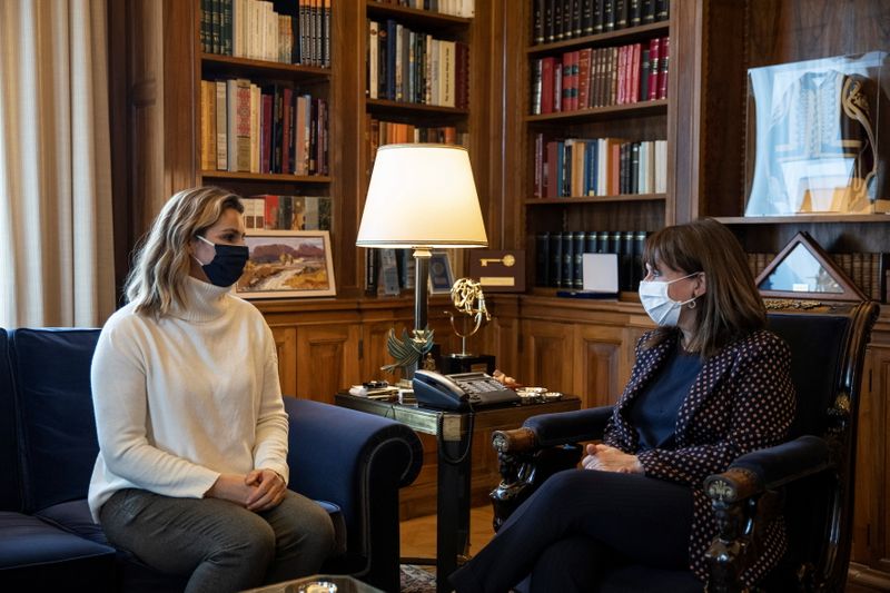 &copy; Reuters. Greek President Katerina Sakellaropoulou meets with Olympic sailing champion Sofia Bekatorou in Athens