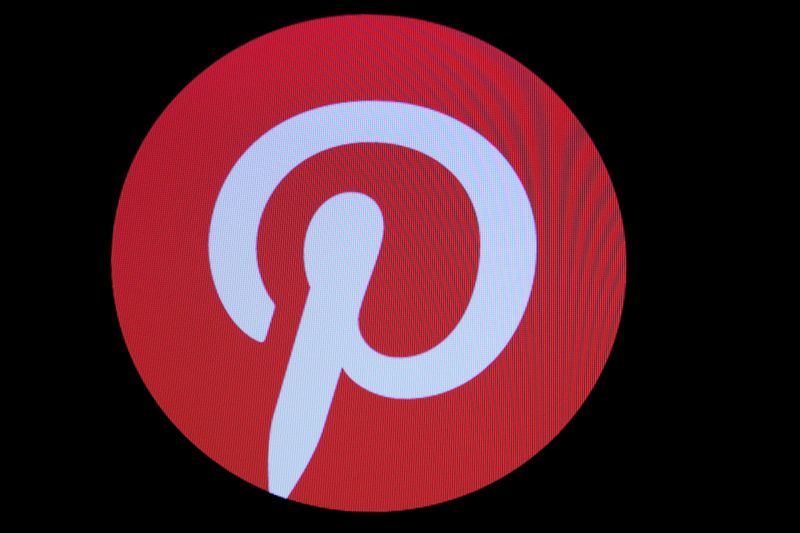 © Reuters. FILE PHOTO: Screens display the company logo for Pinterest Inc. during the company's IPO on the front of the NYSE in New York